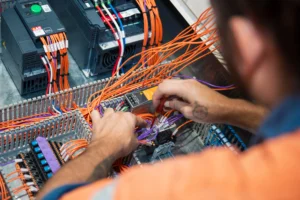 Jetstream Electrical Team member working on circuit board - Electrical Solutions Darwin